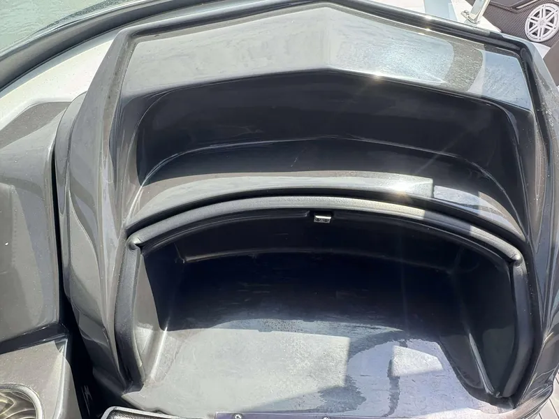 Slide: The Image of Open storage compartment on a 2021 Monterey 255 Super Sport boat. - 8