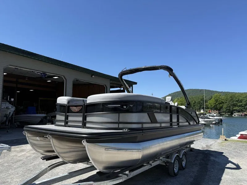 Slide: The Image of 2026 Bennington M Swingback 24 MSB boat with luxurious gray seating. - 10