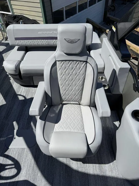 Slide: The Image of 2026 Bennington M Swingback 24 MSB with fold-out table on deck. - 25