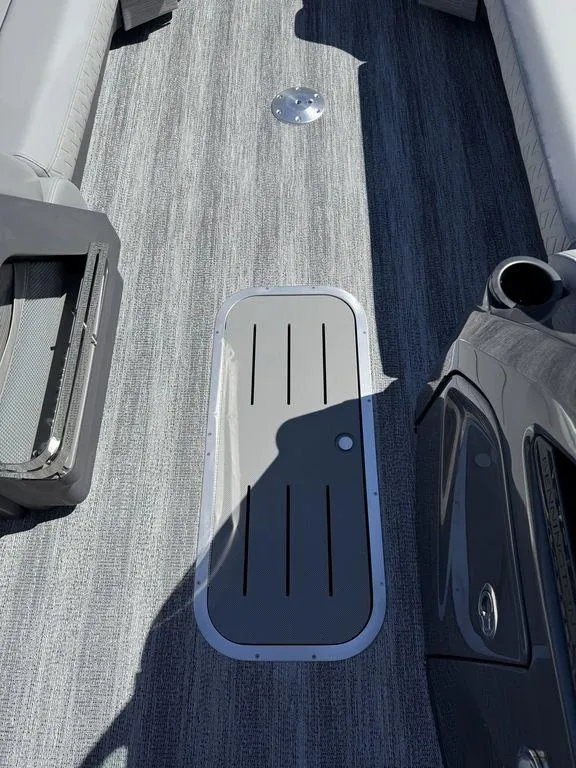 Slide: The Image of 2026 Bennington M Swingback 24 MSB boat interior with luxurious seating and elegant design. - 28