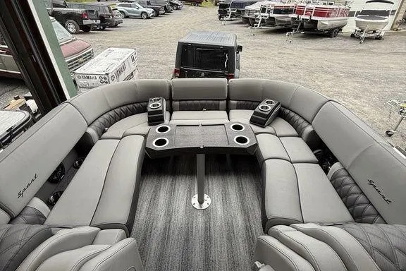 Slide: The Image of Luxurious 2026 Bennington RX Sport Quad Bench 23 RXFB with spacious seating and cup holders. - 20