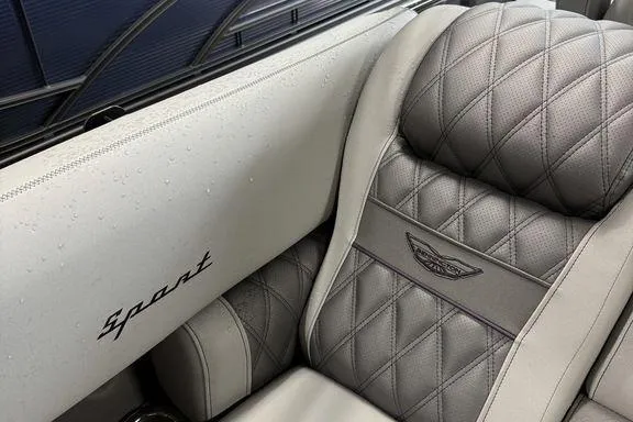 Slide: The Image of Luxurious interior of 2026 Bennington RX Sport Quad Bench 23 RXFB with quilted leather seats. - 21