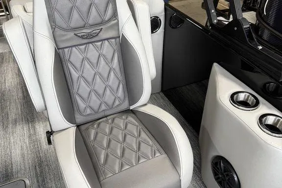 Slide: The Image of Luxurious seating in 2026 Bennington RX Sport Quad Bench 23 RXFB boat interior. - 25