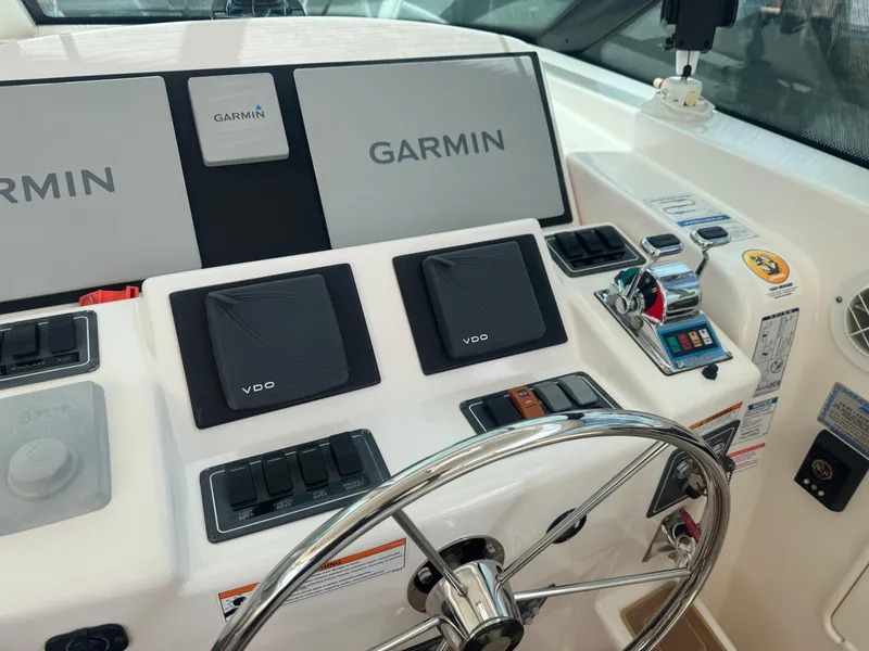 Slide: The Image of Control panel of a 2006 Tiara Yachts 4200 Open with Garmin navigation system. - 25