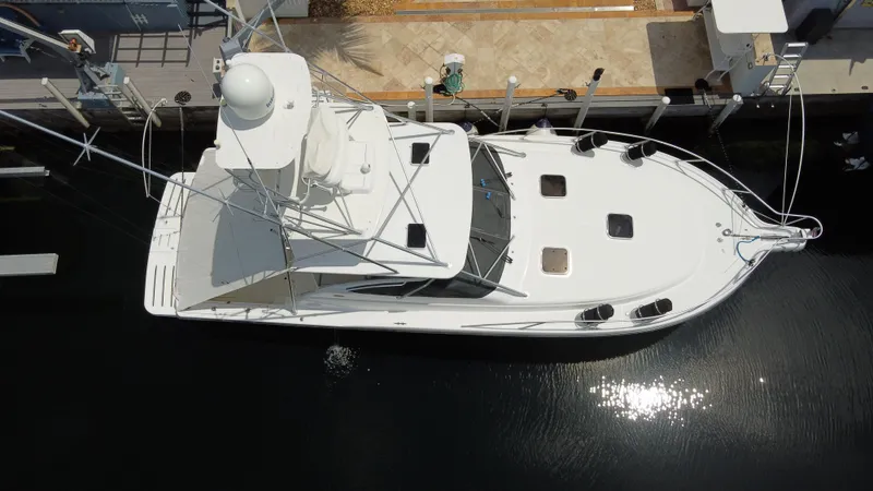 Slide: The Image of Aerial view of 2006 Tiara Yachts 4200 Open docked at marina. - 5