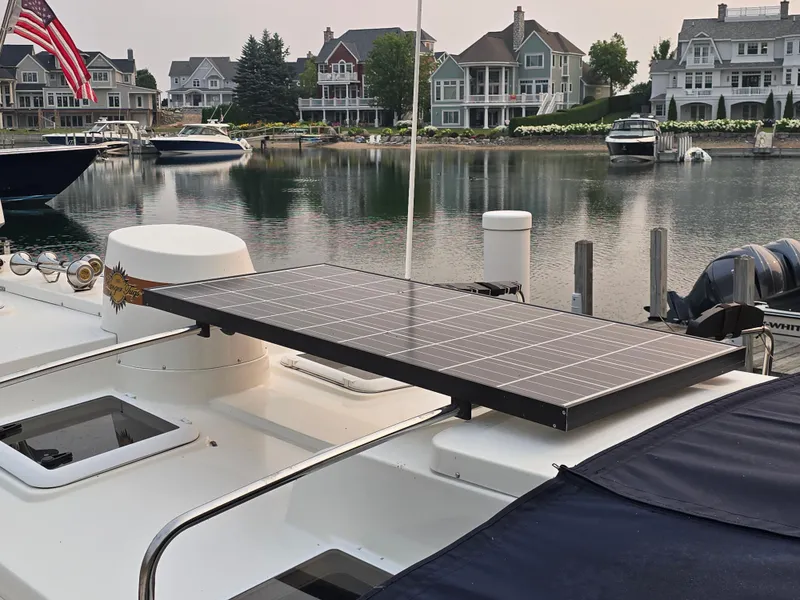 Slide: The Image of 2017 Ranger Tugs R-27 with solar panel docked in scenic marina. - 9