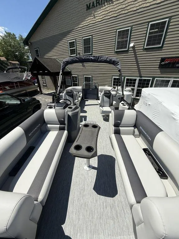 Slide: The Image of 2026 Bennington S Quad Bench 22 SSR pontoon boat with spacious seating and modern design. - 25