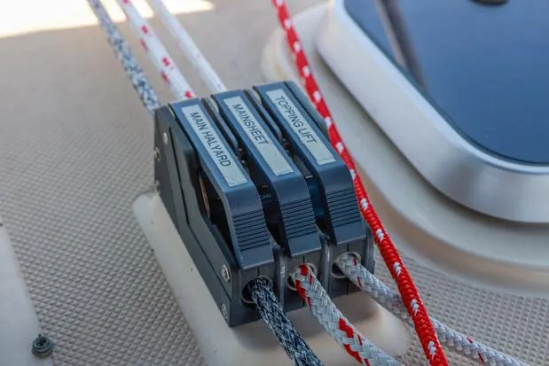 Slide: The Image of Close-up of sailboat rope clutches on a 1998 Island Packet 40. - 10