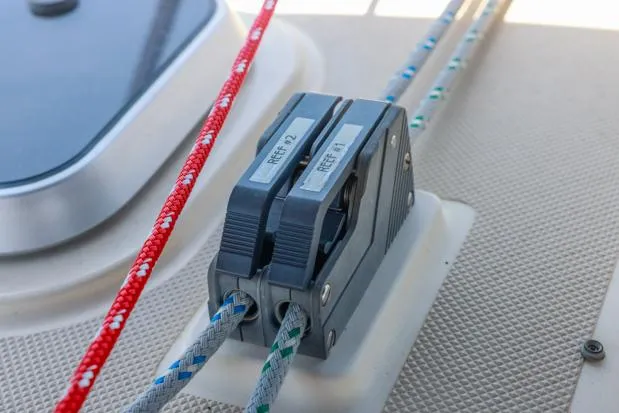 Slide: The Image of Deck hardware with ropes on a 1998 Island Packet 40 sailboat. - 11