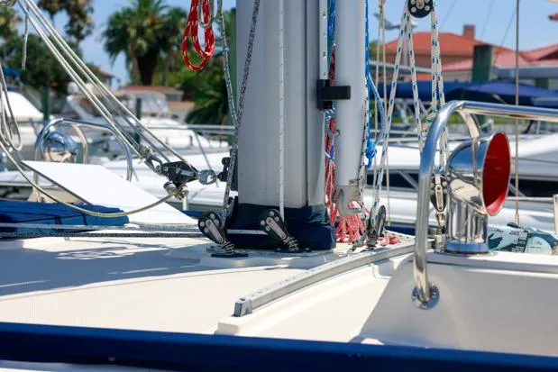 Slide: The Image of Close-up of 1998 Island Packet 40 sailboat deck with rigging and mast details. - 5