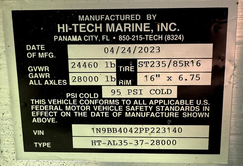 Slide: The Image of 2024 Scout 377 LXF label: Hi-Tech Marine, GVWR 24460 lb, GAWR 28000 lb, tire ST235/85R16. - 42