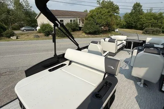 Slide: The Image of 2026 Bennington S Swingback 22 SSB pontoon boat with stylish seating and modern design. - 11