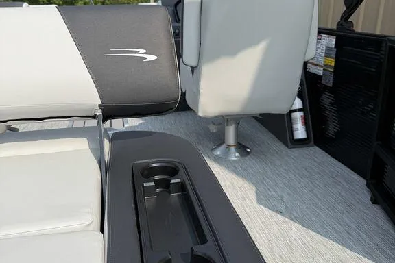 Slide: The Image of Interior of 2026 Bennington S Swingback 22 SSB with seating and cup holders. - 14