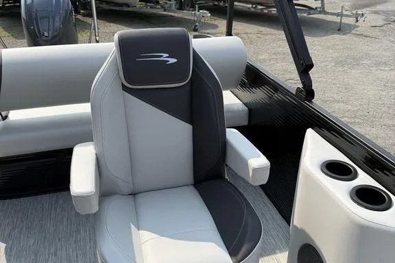 Slide: The Image of 2026 Bennington S Swingback 22 SSB boat interior with stylish seating and cup holders. - 22