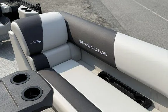 Slide: The Image of 2026 Bennington S Swingback 22 SSB boat seating with cup holders, featuring sleek design. - 27