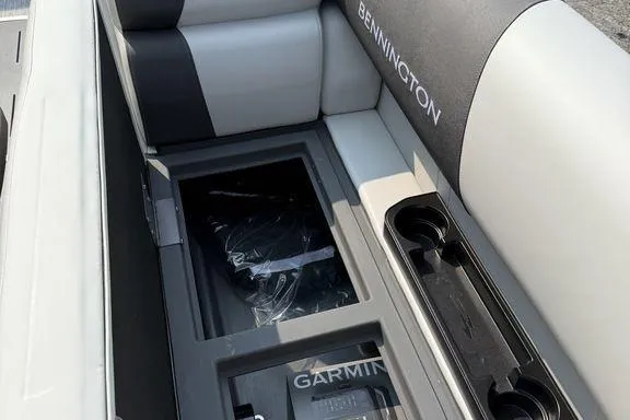 Slide: The Image of 2026 Bennington S Swingback 22 SSB boat interior with Garmin storage compartment. - 34