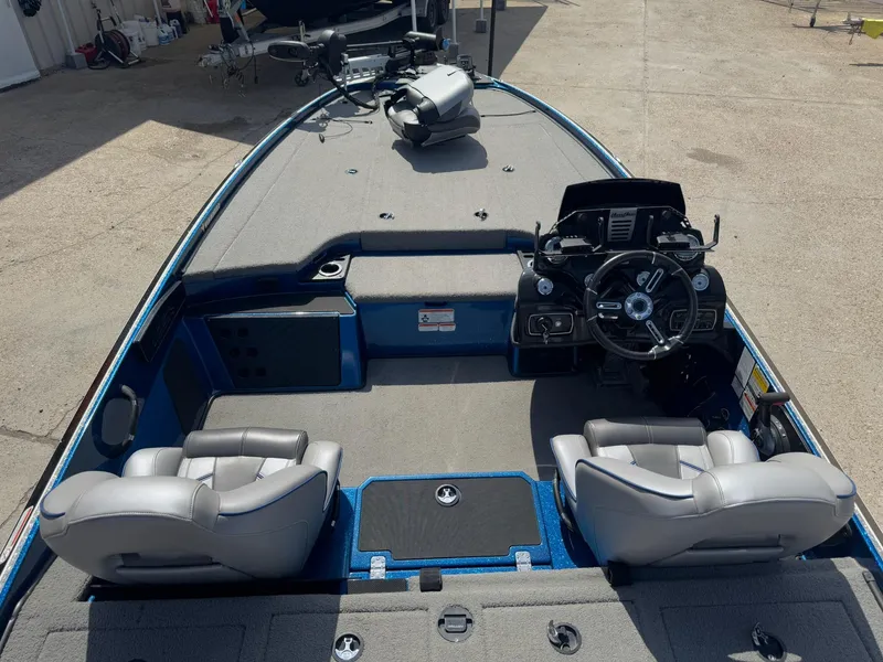 Slide: The Image of 2019 Nitro Z20 boat interior with steering wheel, seats, and fishing deck. - 31