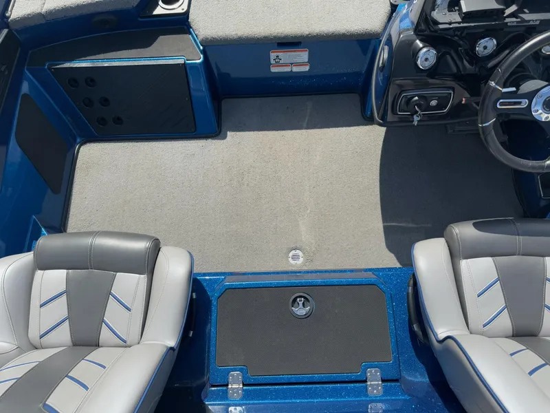 Slide: The Image of Interior of a 2019 Nitro Z20 boat with gray and blue seating. - 32