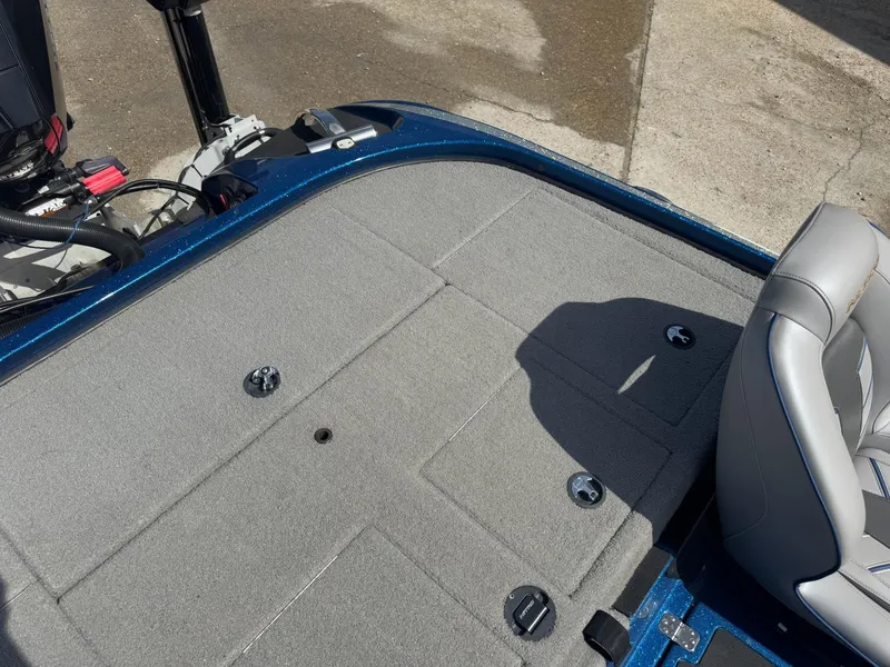 Slide: The Image of 2019 Nitro Z20 boat deck with gray carpet and seating, showcasing storage compartments. - 33