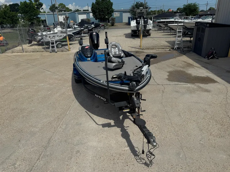 Slide: The Image of 2019 Nitro Z20 boat on trailer in outdoor storage area. - 5