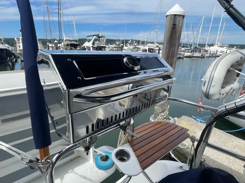 Slide: The Image of Stainless steel grill on a 2004 Hunter 36 sailboat at a marina. - 9