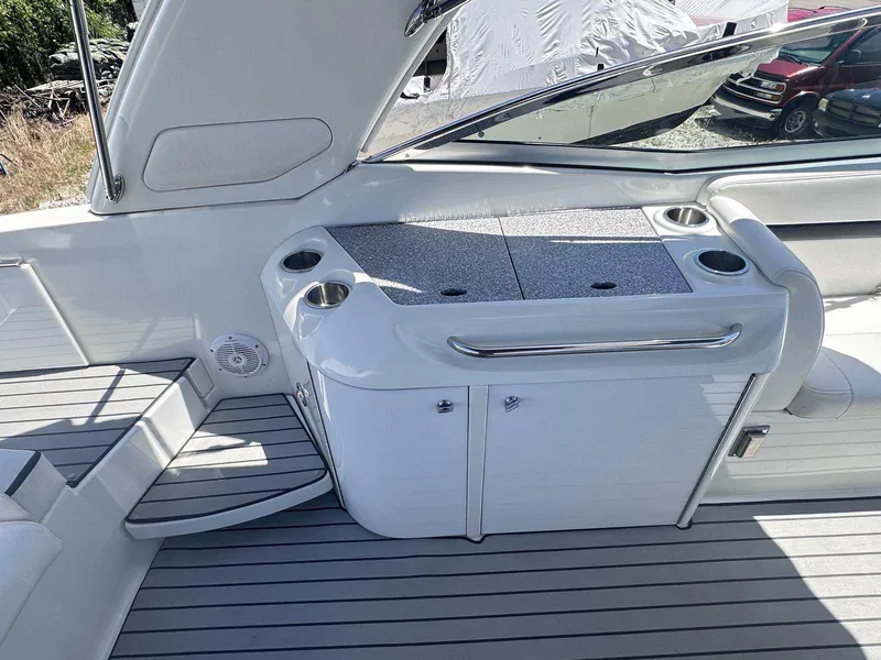 Slide: The Image of 2007 Formula 310 Sun Sport boat interior with sleek seating and modern amenities. - 10