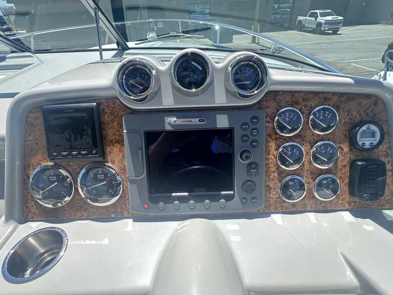 Slide: The Image of Dashboard of a 2007 Formula 310 Sun Sport boat with gauges and navigation system. - 19