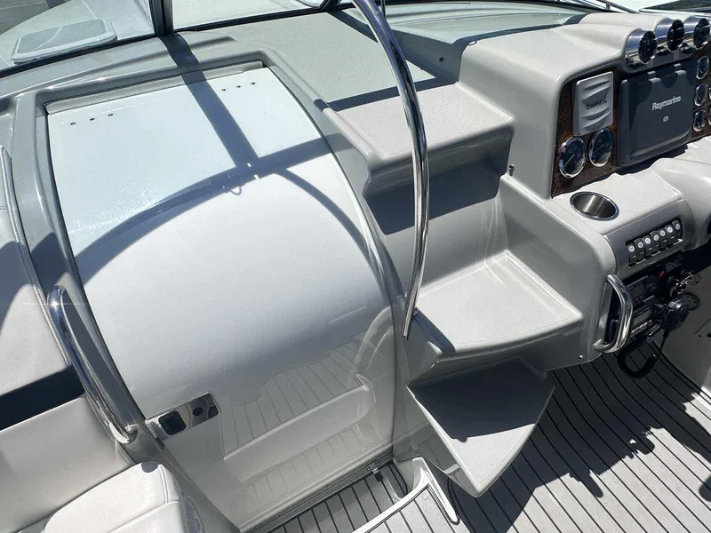Slide: The Image of 2007 Formula 310 Sun Sport boat cockpit with modern controls and sleek design. - 22