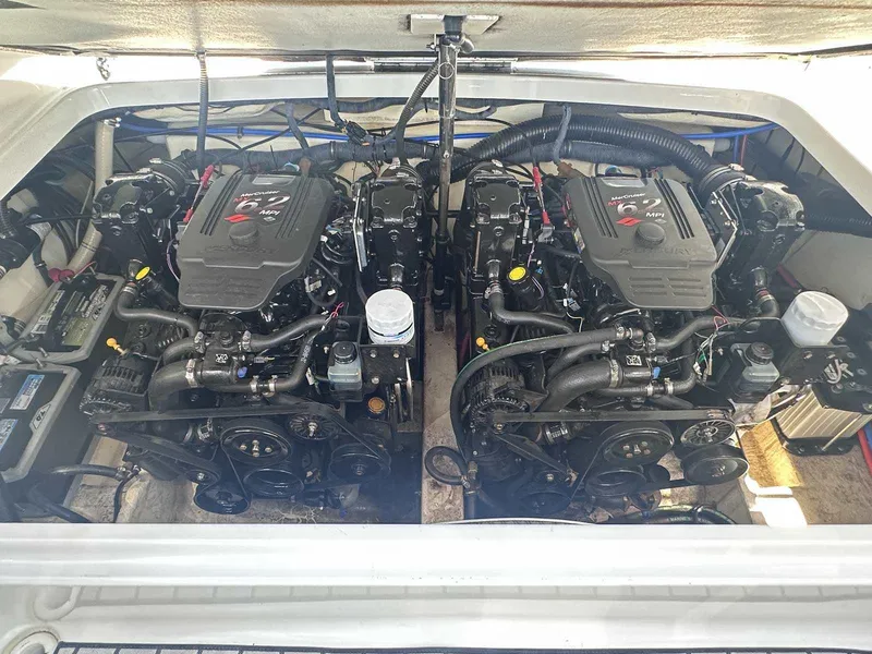 Slide: The Image of 2007 Formula 310 Sun Sport engine compartment with dual MerCruiser 6.2 MPI engines. - 23