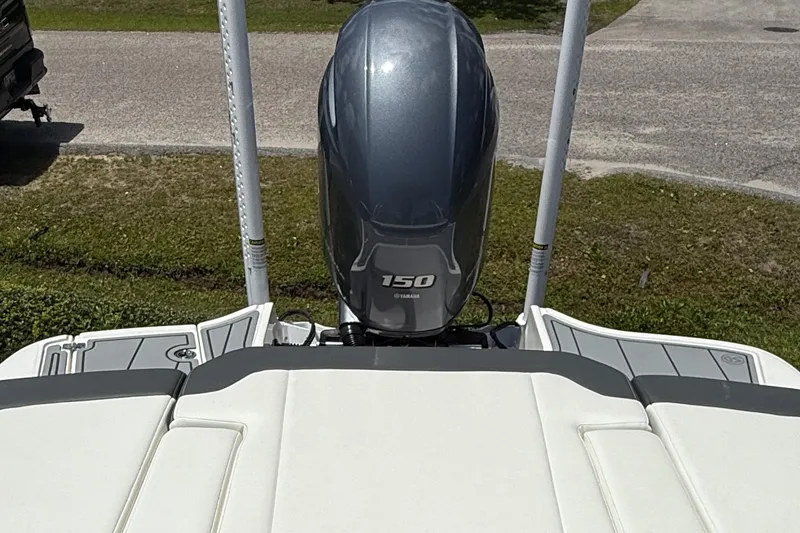 Slide: The Image of 2022 Chaparral 21 SSi OB boat with Yamaha 150 outboard motor, rear view. - 13