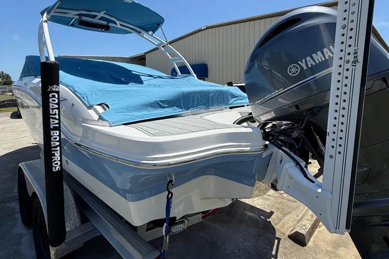 Slide: The Image of 2022 Chaparral 21 SSi OB boat with Yamaha outboard motor on trailer. - 6