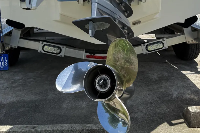 Slide: The Image of 2022 Chaparral 21 SSi OB boat propeller and trailer detail. - 7