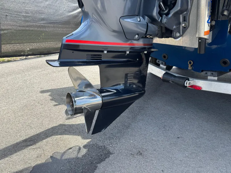 Slide: The Image of Boat motor and propeller of 2022 Xpress H24B on a trailer. - 9