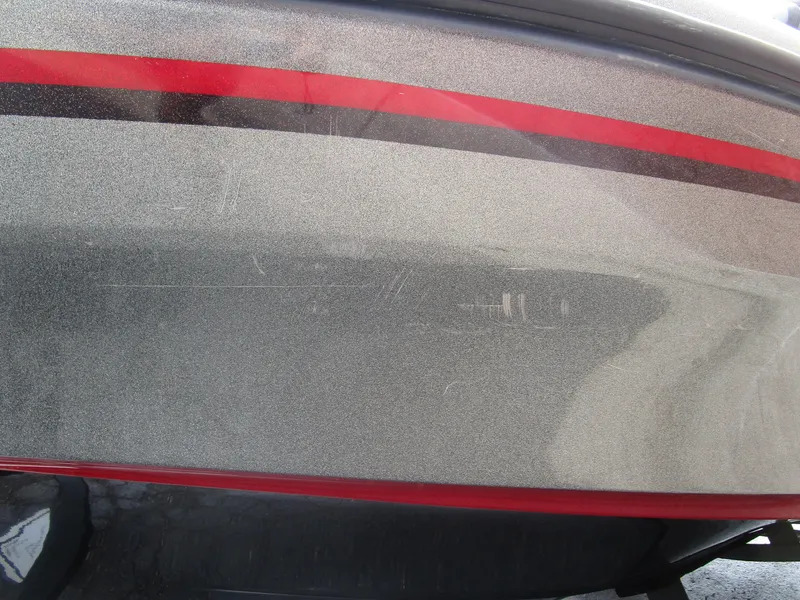 Slide: The Image of Close-up of 2021 Nitro ZV21 boat hull with red stripe detailing. - 11