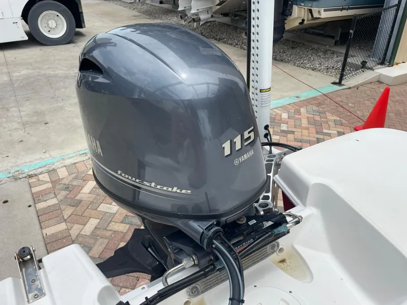 Slide: The Image of Yamaha 115 four-stroke outboard motor on 2021 Hurricane SunDeck Sport 185 OB boat. - 30