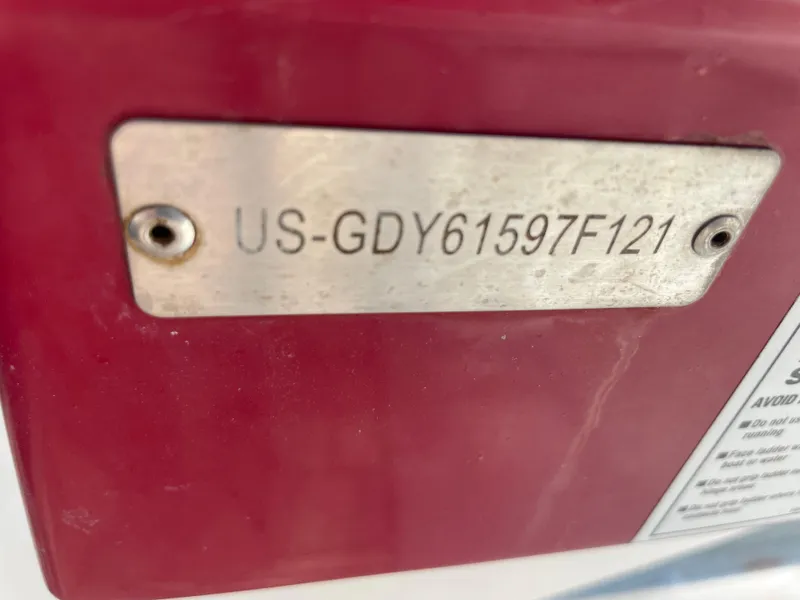 Slide: The Image of HIN plate on 2021 Hurricane SunDeck Sport 185 OB boat, displaying identification number. - 34