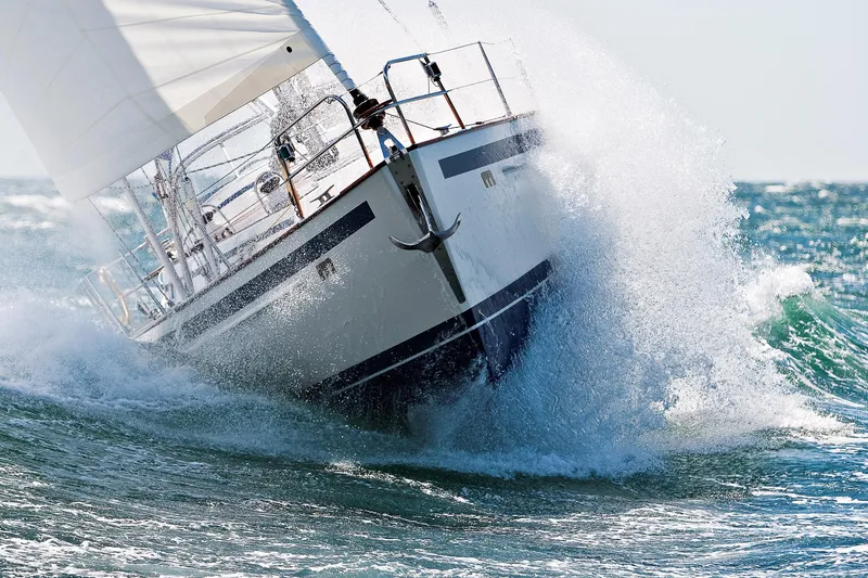 Slide: The Image of Sailboat Malo 43 (2001) cutting through ocean waves. - 3