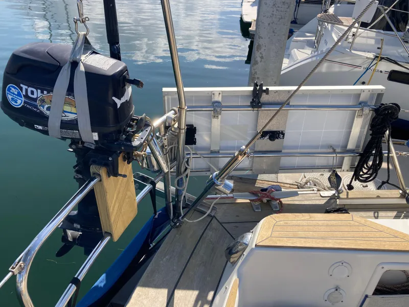 Slide: The Image of Sailboat Malo 43, 2001 model, with outboard motor and docked at marina. - 36