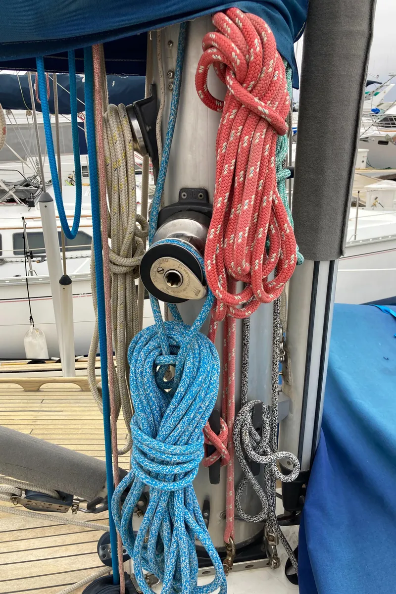 Slide: The Image of Sailboat rigging with colorful ropes on a Malo 43, 2001 model. - 46