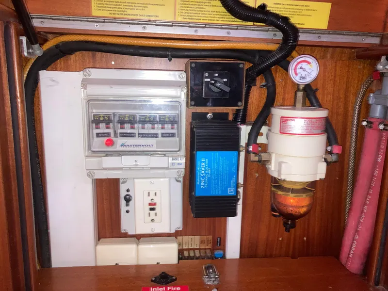 Slide: The Image of Electrical panel and fuel filter system in a 2001 Malo 43 yacht. - 47