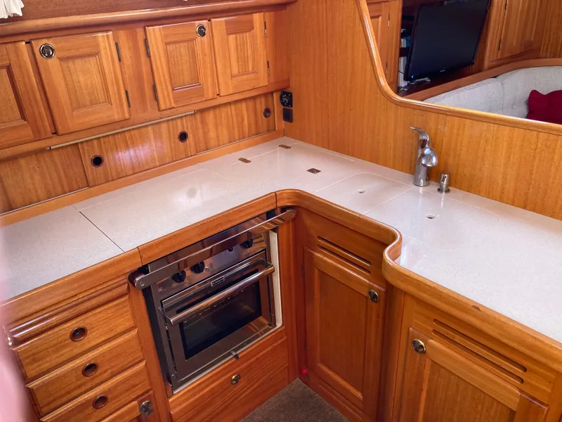 Slide: The Image of Wooden yacht kitchen interior with stove, Malo 43, 2001 model. - 8