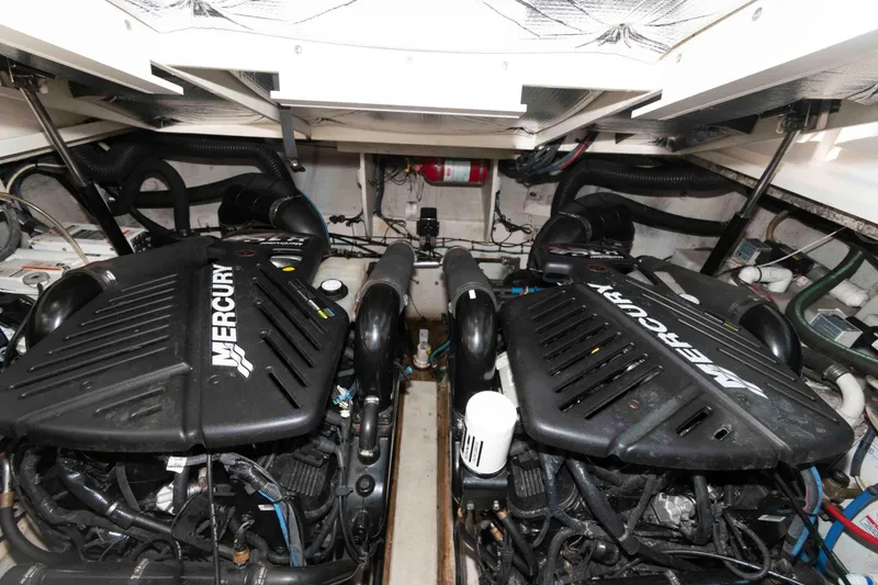Slide: The Image of Engine room of 2007 Sea Ray 340 Sundancer with twin Mercury engines. - 20