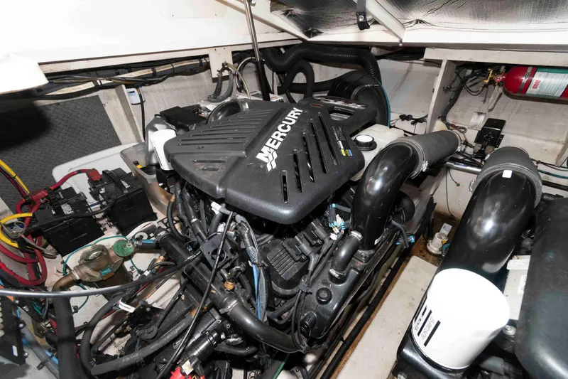 Slide: The Image of Engine room of 2007 Sea Ray 340 Sundancer with Mercury engine components. - 21
