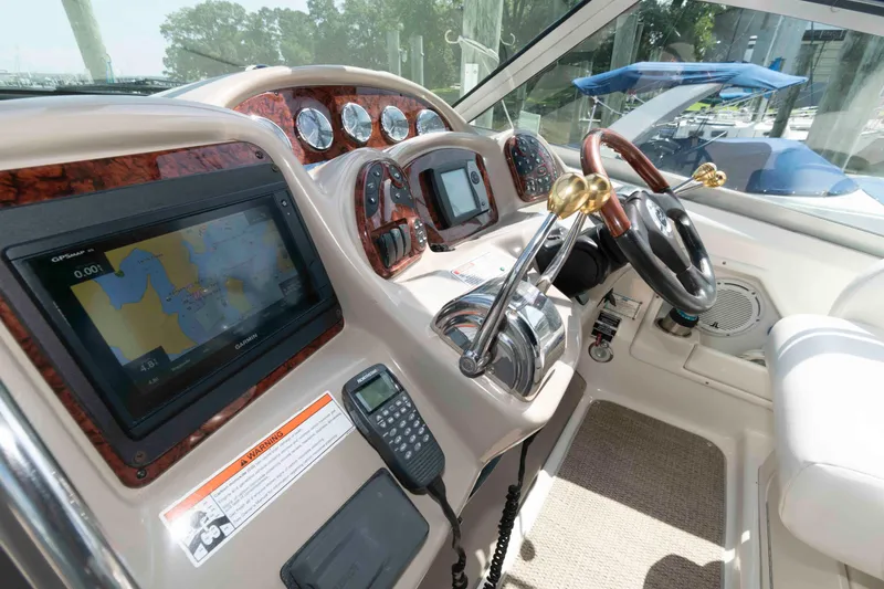 Slide: The Image of Interior helm of 2007 Sea Ray 340 Sundancer with navigation system and controls. - 7