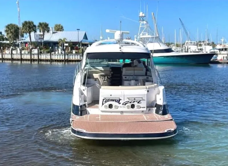 Slide: The Image of 2008 Four Winns V458 yacht docked in a marina with clear blue skies. - 4