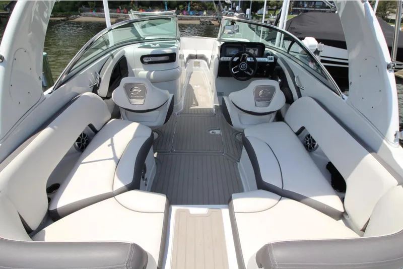 Slide: The Image of 2023 Crownline 270 SS boat interior with spacious seating and modern design. - 13