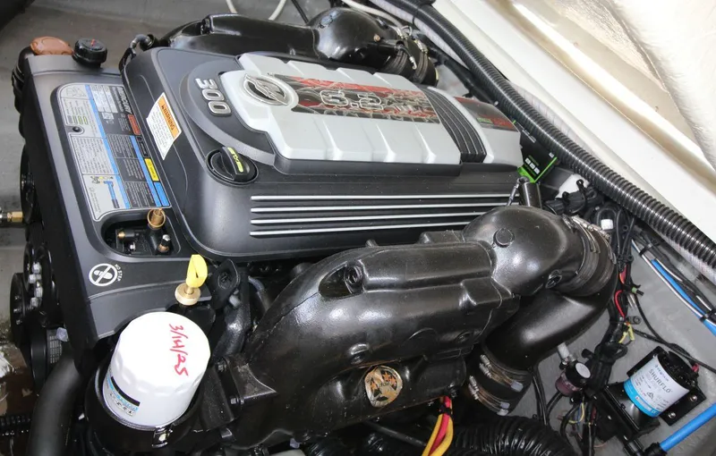 Slide: The Image of Engine compartment of 2023 Crownline 270 SS boat, featuring a powerful 300 HP engine. - 20