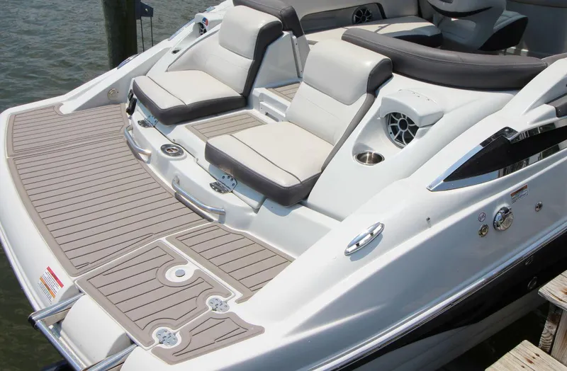 Slide: The Image of 2023 Crownline 270 SS boat with spacious seating and sleek design. - 9
