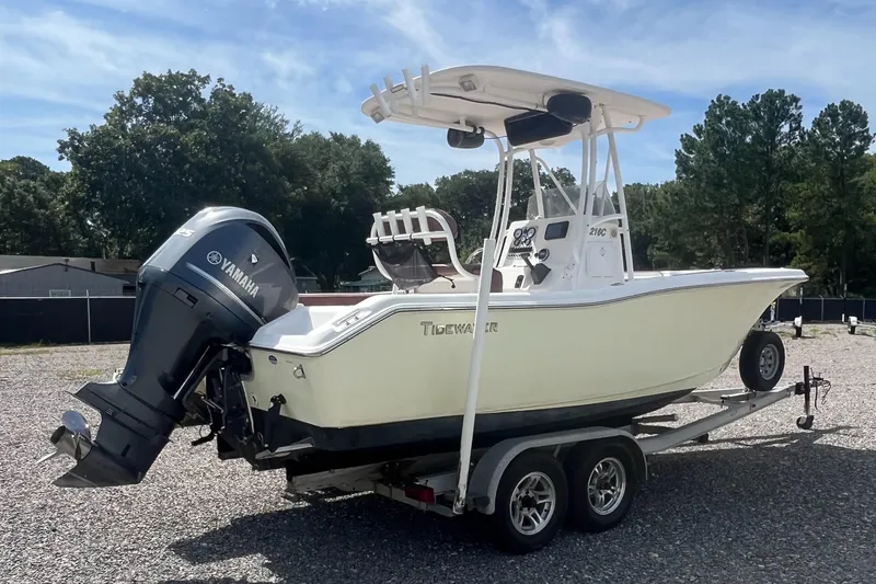 Slide: The Image of 2010 Tidewater 216 CC Adventure boat on trailer with Yamaha outboard motor. - 4