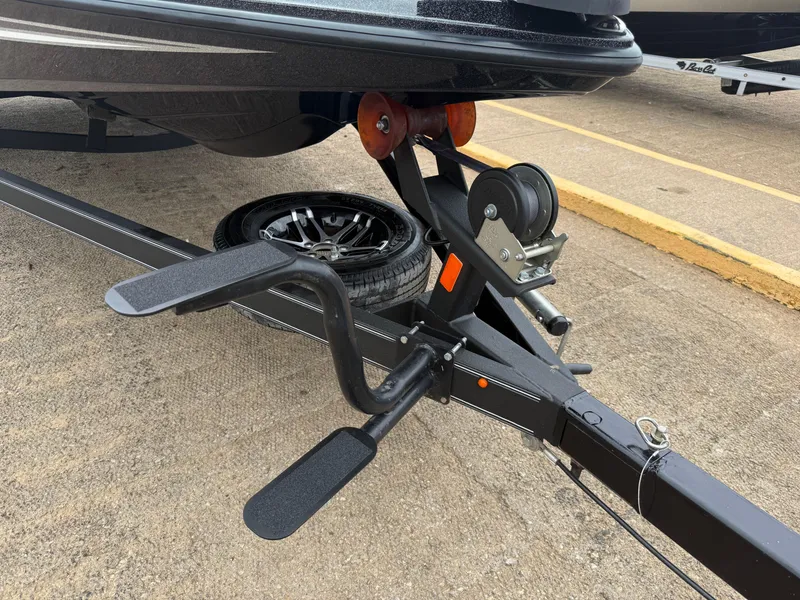 Slide: The Image of Trailer hitch of 2022 Skeeter ZX 150 boat on concrete surface. - 27